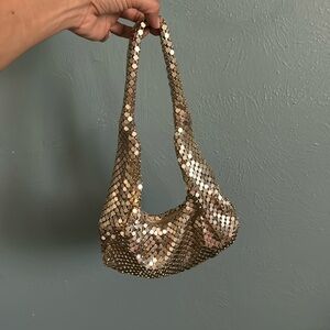 Gold shiny textured small zippered purse